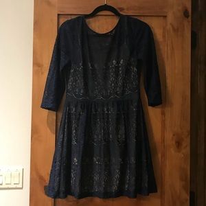 Blue dress with tan inside.